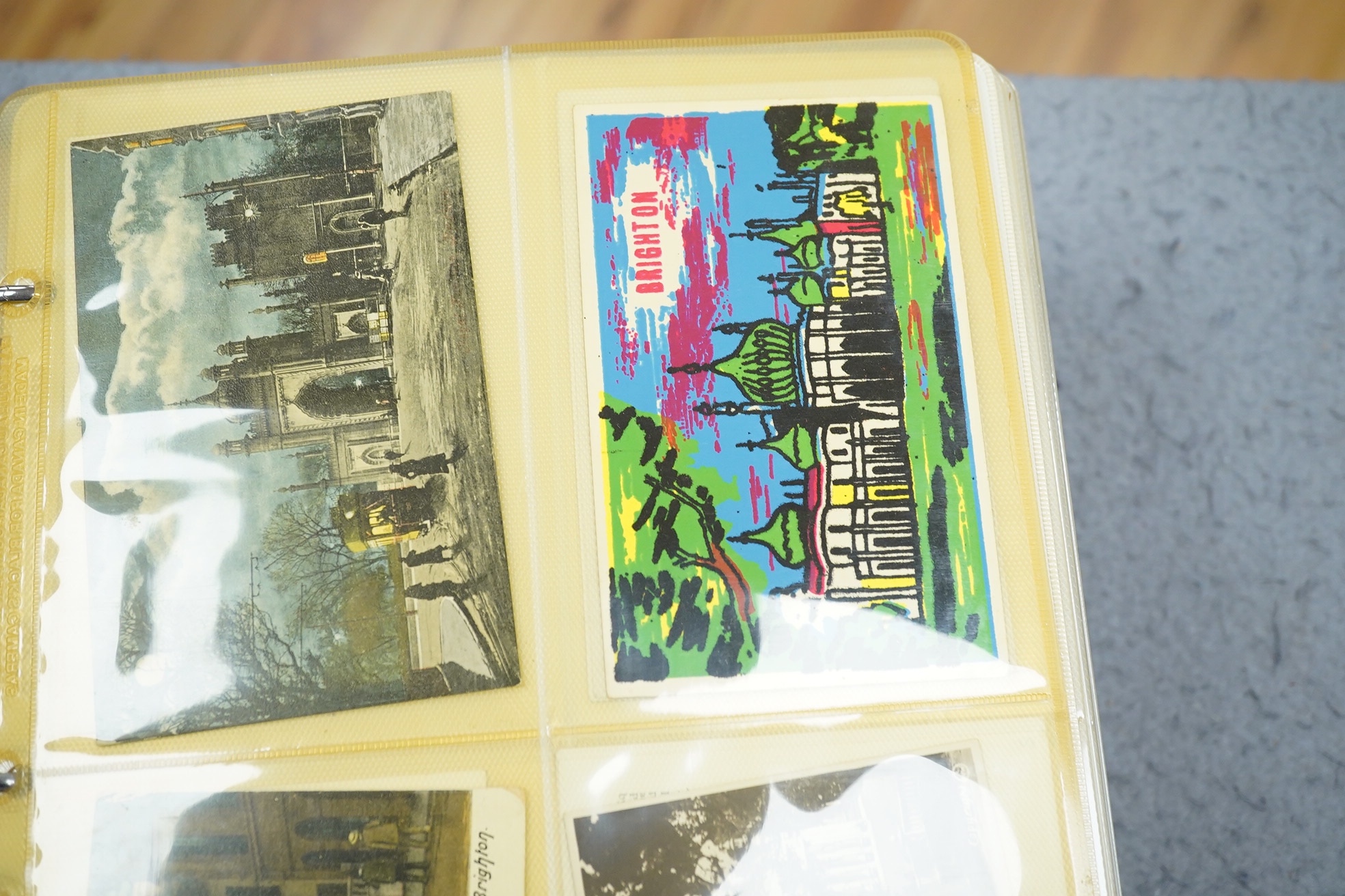 Three assorted postcard albums; a good selection of Brighton, Hove and Environs. Condition - as viewed